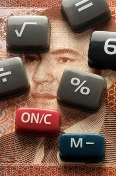 Keys of electronic calculator on moroccan dirham Stock Photos