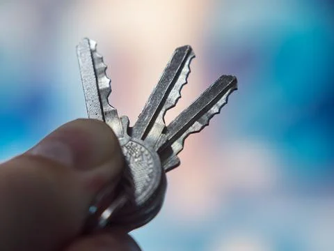 Keys in Hand with Blurred Background for Security Context Stock Photos