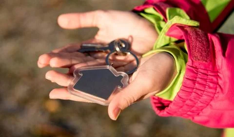 Keys in hand Stock Photos