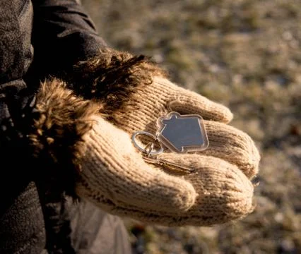 Keys in hand Stock Photos