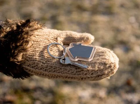 Keys in hand Stock Photos
