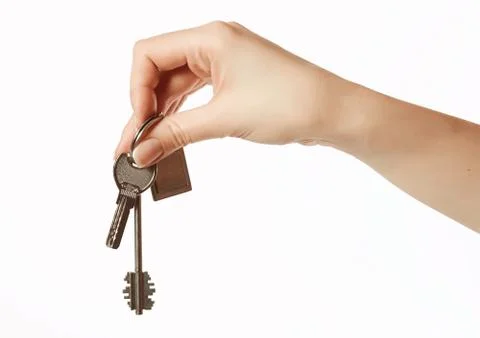 Keys in hand Stock Photos