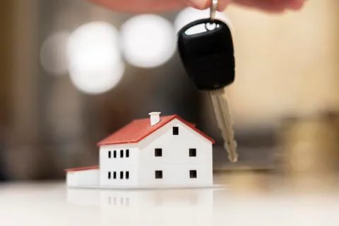 Keys in hand Stock Photos