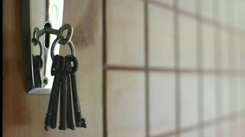 Keys hanging on door Видео 49676807
