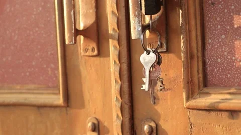 Keys hanging on lock. Stock Footage 169585515