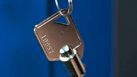 Keys with key chain hanging on door Stock Footage 72450742