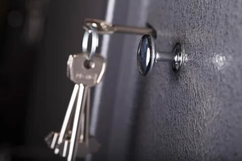 Keys in the keyhole closeup Stock Photos