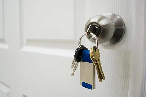 Keys in a latch Stock Photos