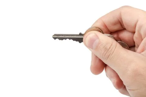 Keys from the lock in hand on white background. Stock Photos