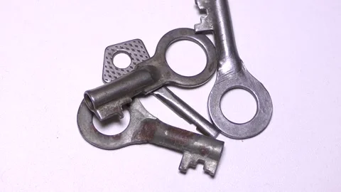 Keys to the lock on a white background Stock Footage 165611049