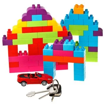 Keys, model car, plastic block house plastic block house, door and car key... Fotos Stock