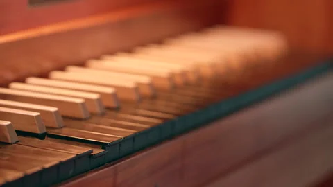 The keys of an organ move automatically.  Stock Footage 276226548