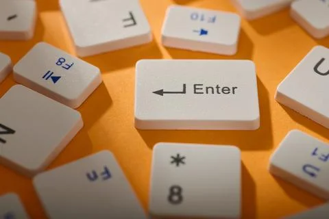Keys of an white keyboard on a table Stockfoto's