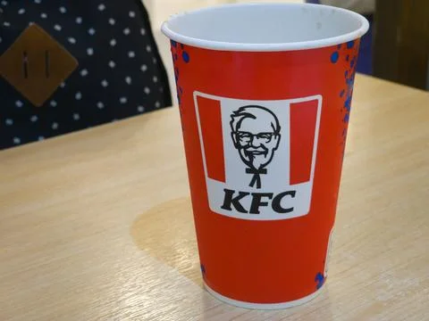 KFC cup without plastic symbolize restaurant adopt environmental protection. Stock Photos