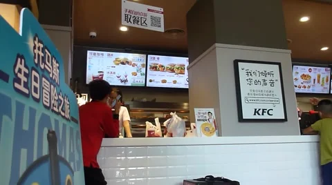 KFC restaurant in the interior of the landscape in China Vídeos de archivo 65106741