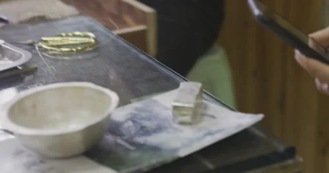 KG of Silver on table Stock Footage 141362626