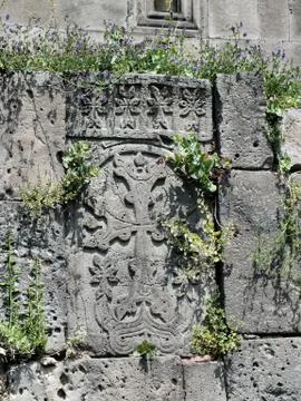 Khachkar in a monastery wall Stock Photos