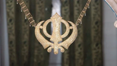 Khanda symbol of Sikhism hanging inside Gurdwara Panja Sahib Video stock 86659640