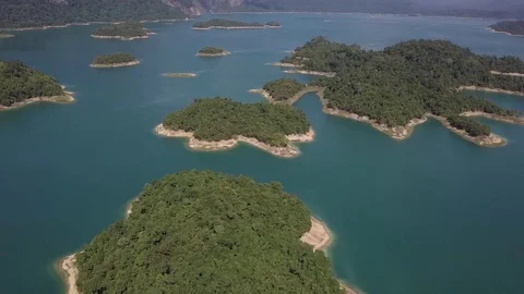 Khao Sok lake with small islands in blue lake in Thailand Stock Footage 123712713