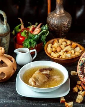 Khash soup with side crackers and vegetables Stock Photos