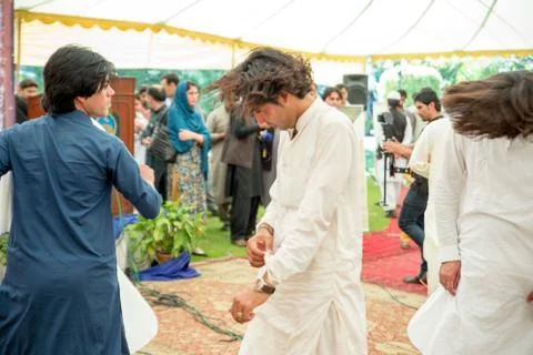Khattak dance ,50 couples getting married in CM House Stock Photos