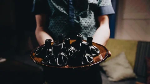 Khinkali on a beautiful table with wine Stock Footage 141482221
