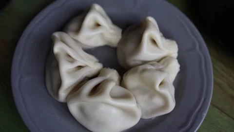 Khinkali dumplings on plate close up Stock Footage 331200792
