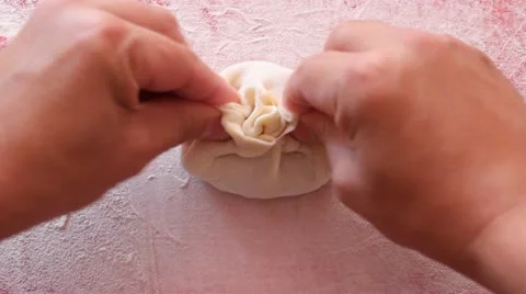 Khinkali-meat pelmeni, dumplings with black pepper do manually Stock Footage