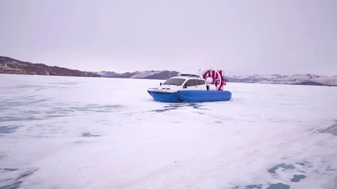 Khivus boat. Hovercraft Rides On ice-bound Baikal lake. Side View. Stock Footage 140962928