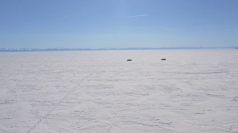 Khivus modern transport hovercraft lake Russia Siberia Arctic winter snow Aerial Stock Footage 80973473