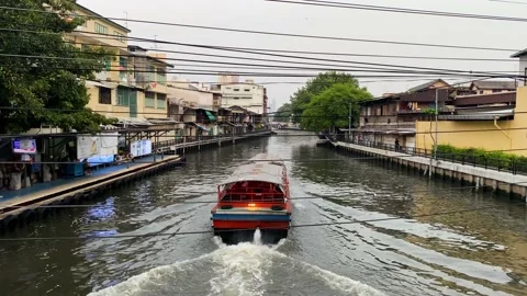 Khlong Boat navigate through Saen Saep canal in Bangkok, Thailand 4K Stock Footage 178884211