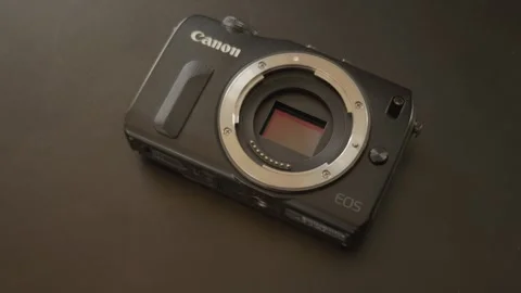 Khmelnytskyi, Ukraine - August 25 2024 - The Canon Eos M without lens Stock Footage 285388615