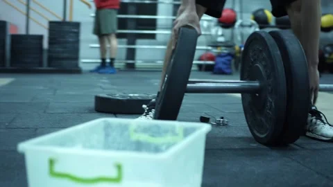 KHMELNYTSKYI, UKRAINE - MAY 9, 2020: Close-up on Hands: Sportsman Puts Stock Footage 132724397