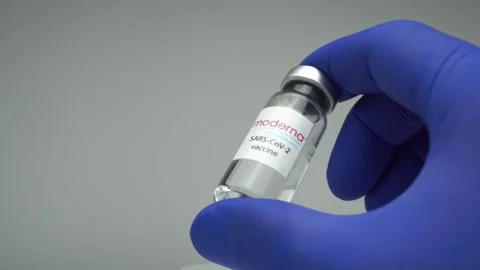 KHMELNYTSKYI, UKRAINE - NOVEMBER 27, 2020. Coronavirus MODERNA company vaccine Stock Footage 144119547