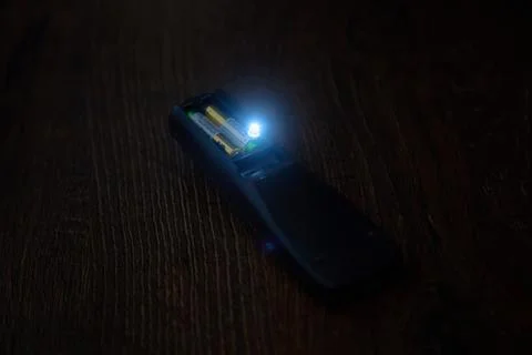 Khmelnytskyi, Ukraine - September 2025: LED light in remote control during Stock Photos