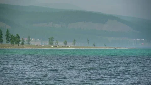 Khovsgol Lake in Mongolia surrounded by pine forest - Huvsgul and Taiga Shore Stock Footage 339826721