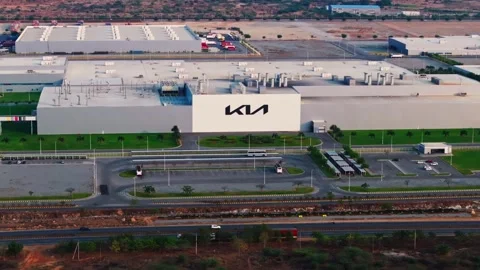 KIA manufacturing unit front view with Logo, national highway 44 and vehicles Stock Footage 337967414