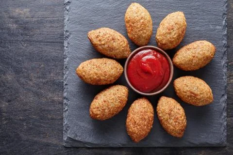 Kibbeh homemade middle eastern beef, lamb, goat or camel meat stuffed bulgur Stock Photos