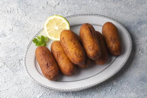 Kibbeh is a popular dish in Middle Eastern cuisine (Turkish name; icli kofte) Stock Photos