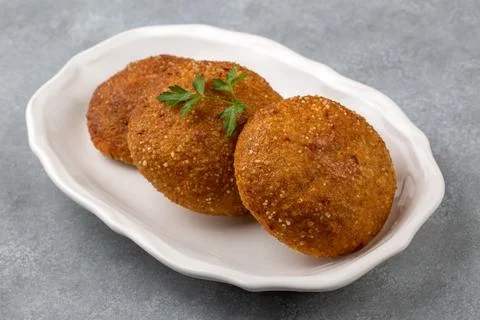 Kibbeh is a popular dish in Middle Eastern cuisine (Turkish name; icli koft.. Stock Photos