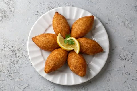 Kibbeh is a popular dish in Middle Eastern cuisine (Turkish name; icli kofte) Stock Photos