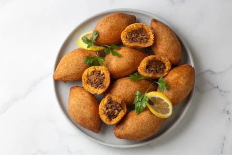 Kibbeh is a popular dish in Middle Eastern cuisine (Turkish name; icli kofte) Stock Photos
