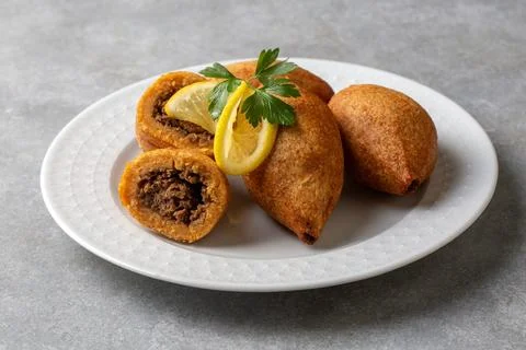 Kibbeh is a popular dish in Middle Eastern cuisine (Turkish name; icli kofte) Stock Photos