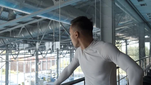 Kickboxer athlete is resting after a workout in the gym with mirrors. Stock Footage 114293133