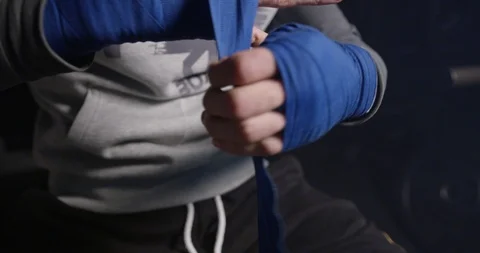 Kickboxer training in low light gym. Sportsman boxing.alone. Stock Footage 126043119