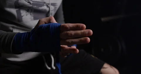 Kickboxer training in low light gym. Sportsman boxing.alone. Stock Footage 126043227