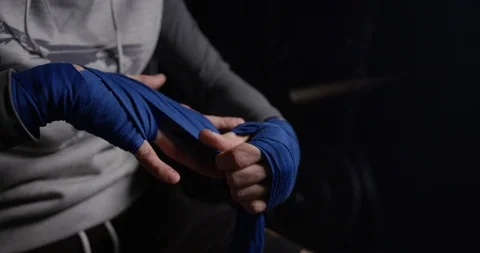 Kickboxer training in low light gym. Sportsman boxing.alone. Stock Footage 126043662