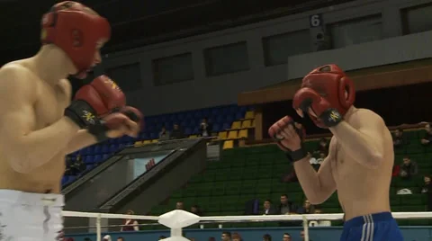 Kickboxers are fighting in the ring Stock Footage 33798349