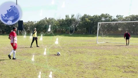 Kicker placing ball running and kicking in soccer practice goalkeeper diving Stock Footage 333859504