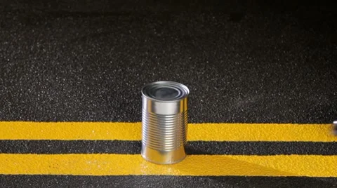 Kicking the Can down the road, up close Video stock 8825336
